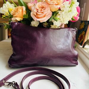 Rough & Tumble aubergine traveler with pearl and plum lining